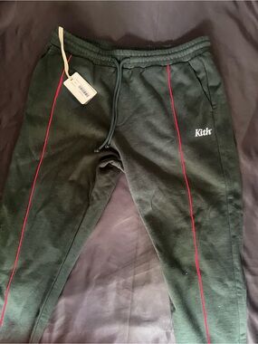 Kith Dark Green Sweatpants with Red Piping